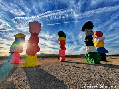 Stone art refuses to blend in the desert at seven magic mountains, Vegas